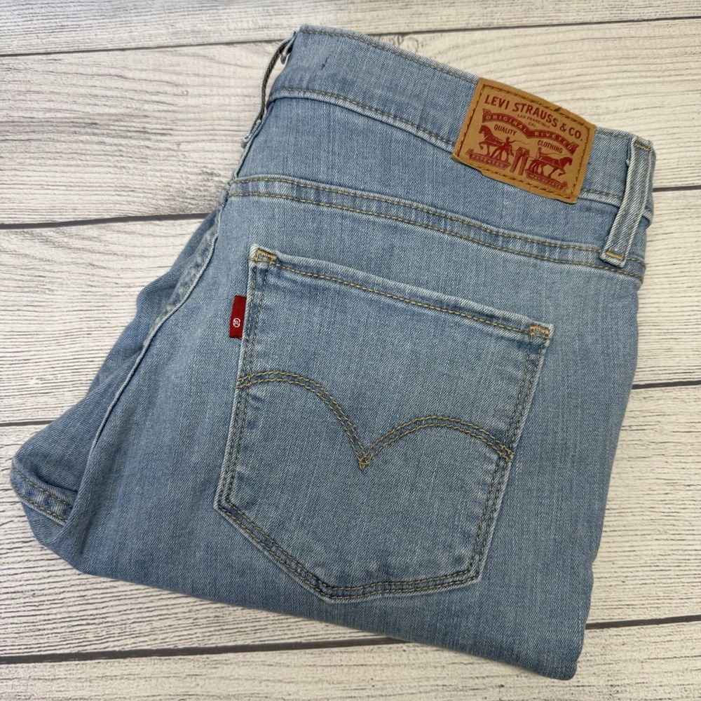 Levis Women's 720 High Rise Super Skinny Size 30 Distressed Blue Jeans